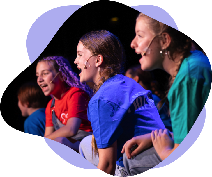 our-story-hero Centerstage Hero of students singing